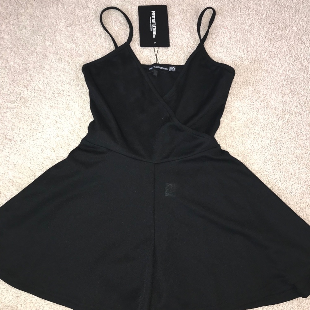 NWT black pretty little thing crossover romper